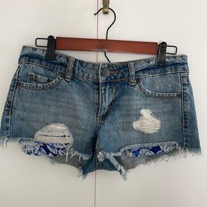 Distressed mid/low rise jeans